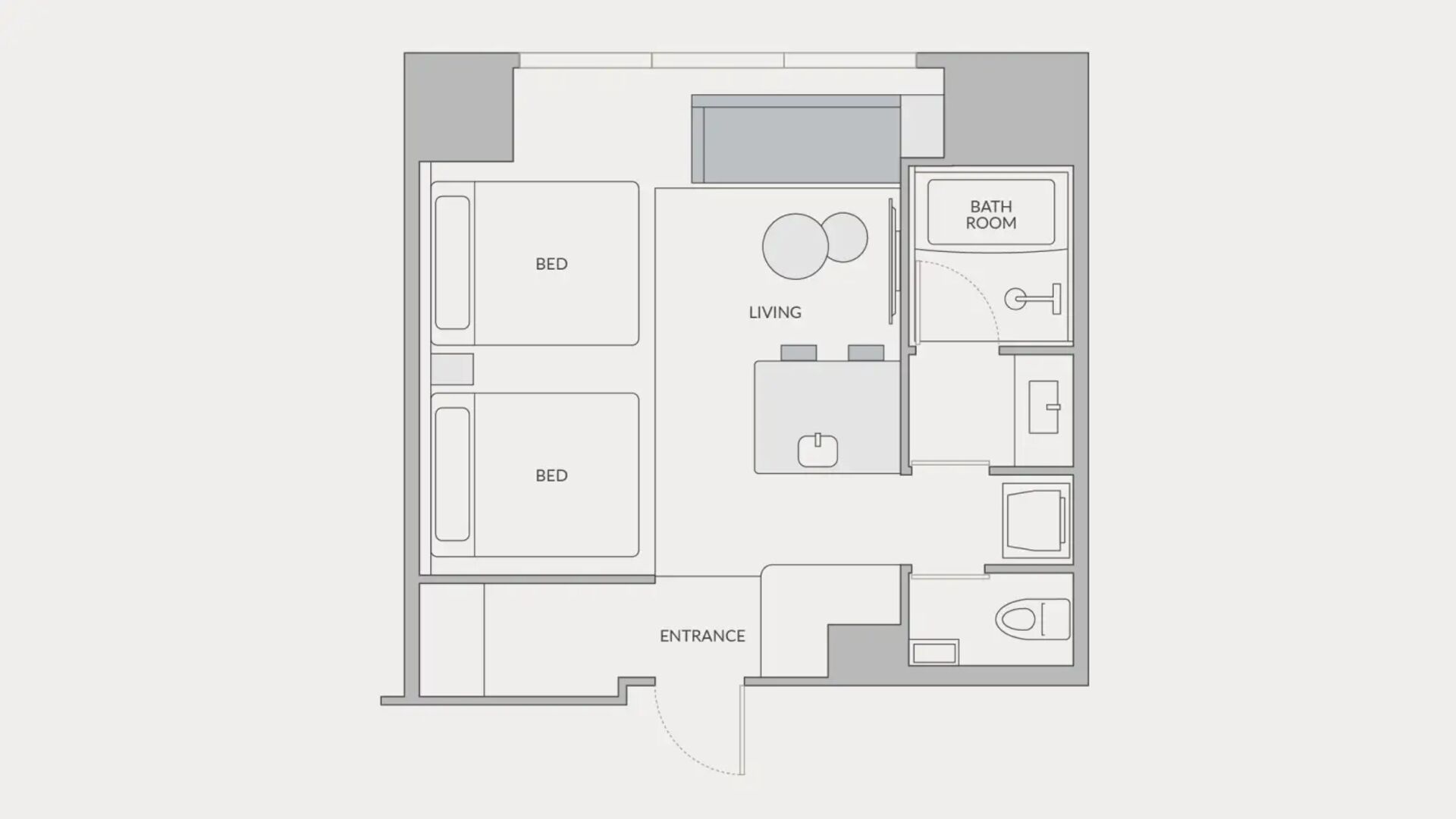 A floor plan with a living area, two bedrooms, a bathroom, and an entrance.