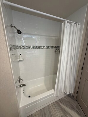 Hair dryer, towels, soap, shampoo