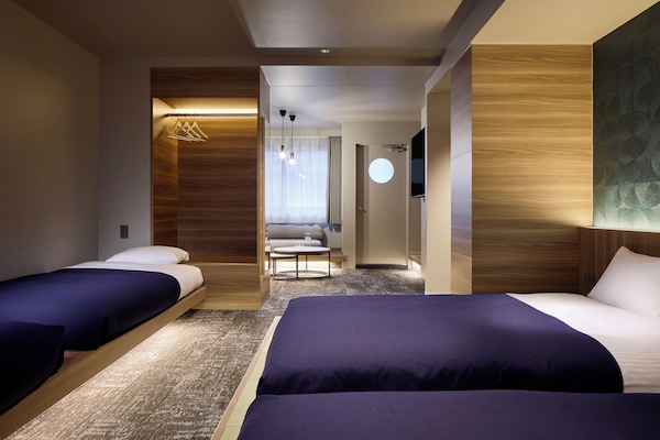 Deluxe-Apartment, 2 Schlafzimmer | Daunenbettdecken, Zimmersafe, kostenloses WLAN, Bettwäsche