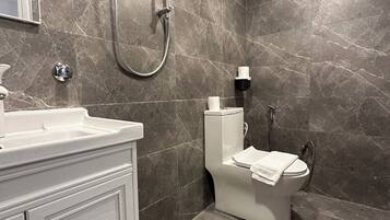 Shower, free toiletries, hair dryer, slippers