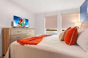 1 habitación, tabla de planchar con plancha y cuna de viaje
