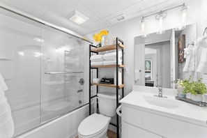 Hair dryer, towels, soap, shampoo