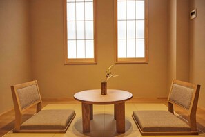 Superior Quadruple Room | Living area | 43-inch LED TV with cable channels, Netflix, streaming services - MKG HOTEL Asakusa (Tokyo)