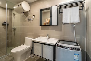 Shower, hair dryer, towels, shampoo
