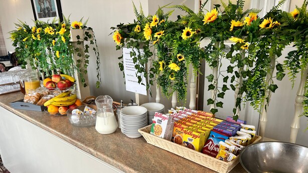 A breakfast buffet with various food items, including fruits, cereals, and beverages. - Gresham Hotel Blackpool (Blackpool)