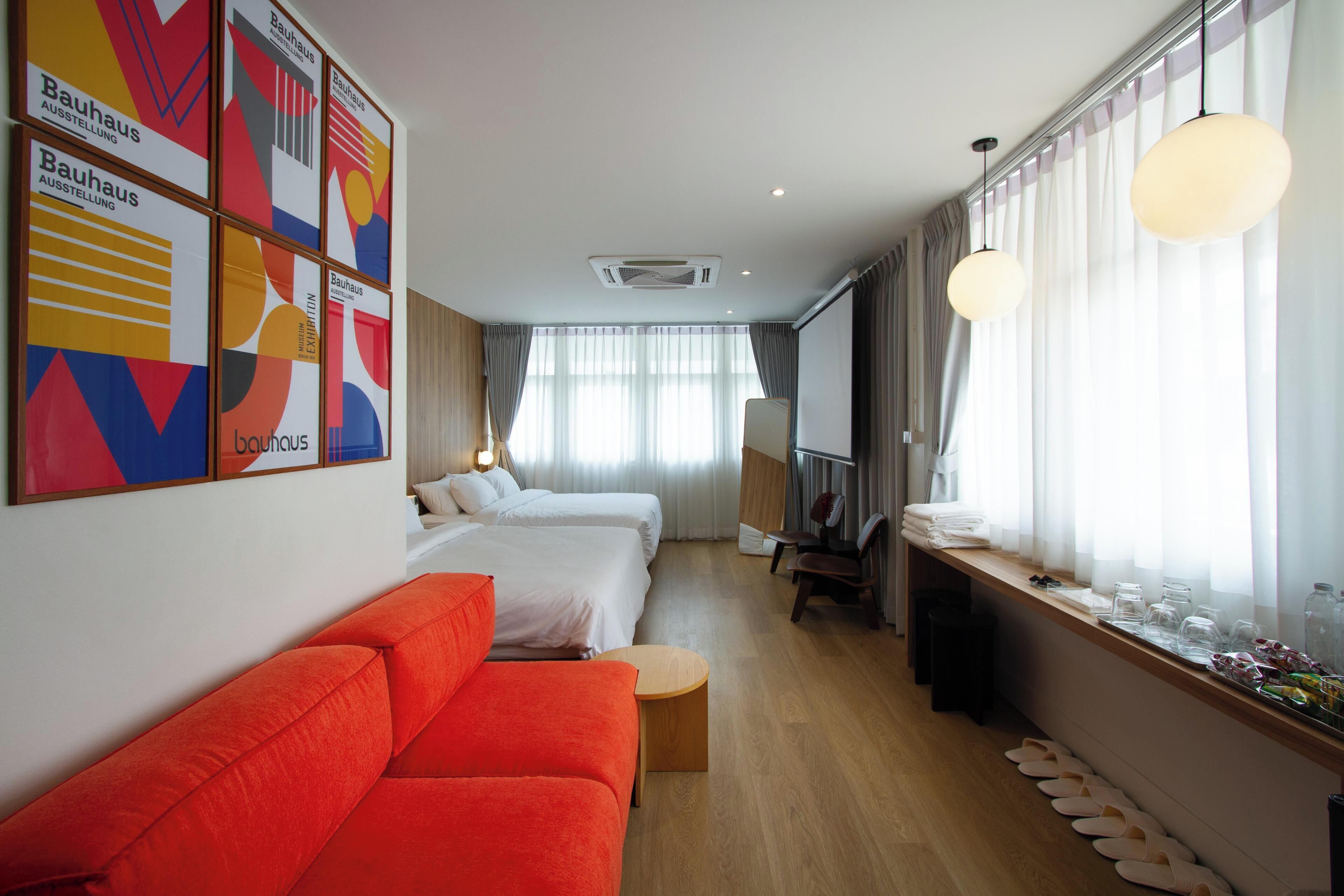 Deluxe Triple Room | Living area