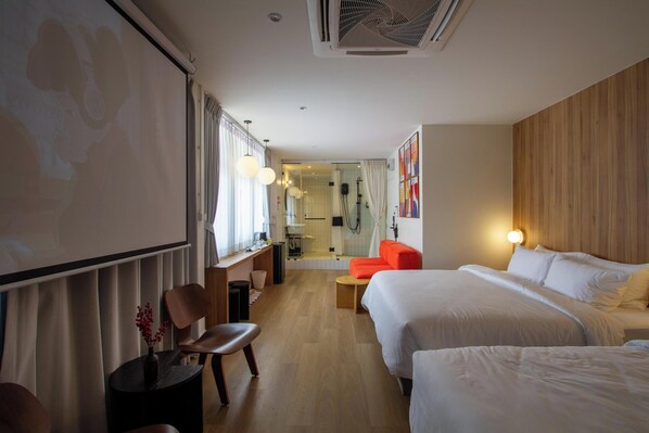 Deluxe Triple Room | Área de sala de estar