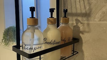 Hair dryer, towels, soap, toilet paper