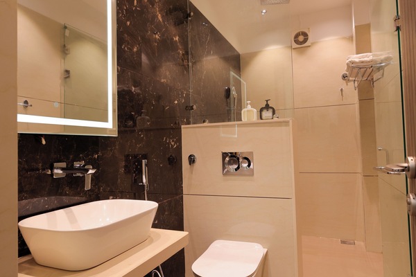 Shower, free toiletries, slippers, soap