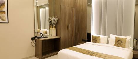 Deluxe Single Room, Housekeeping | In-room safe, desk, laptop workspace, iron/ironing board