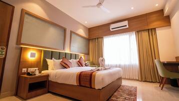 Superior Suite | 1 bedroom, desk, laptop workspace, blackout curtains