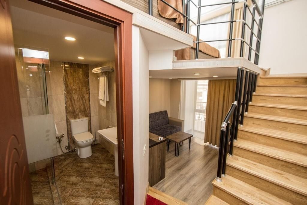 Family Duplex, Balcony, City View | Premium bedding, minibar, in-room safe, desk