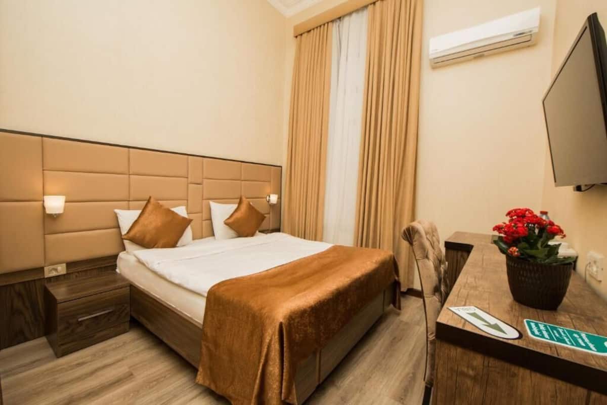 Exclusieve tweepersoonskamer, uitzicht op stad | 1 slaapkamer, luxe beddengoed, een minibar, een kluis op de kamer