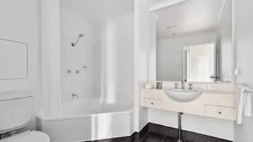 Shower, hair dryer, towels, shampoo