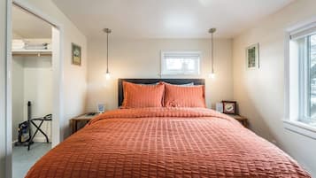 1 bedroom, desk, iron/ironing board, travel crib
