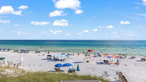 A beach with umbrellas, sun loungers, and a clear sky. - Private Pool + 6  ppl Golf Cart - Blue Mtn. Beach (Santa Rosa Beach)