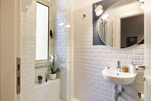 Shower, eco-friendly toiletries, hair dryer, bidet