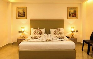 Deluxe Room | Egyptian cotton sheets, premium bedding, pillowtop beds, in-room safe - Kairvi Fort Resort Moradabad (Moradabad)
