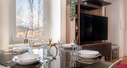 GuestHost - Charming and modern apartment of about 50 sqm, perfect for two guests, located on the ground floor (two steps to access). The property is located in San Vito di Cadore, a hidden jewel in the Dolomites, just 10 km from Cortina d'Ampezzo and a