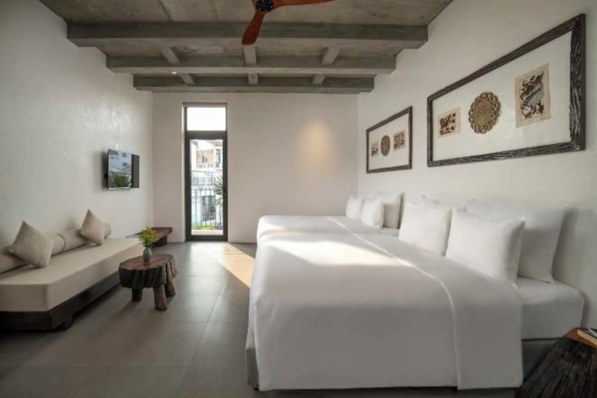 Pillow-top beds, desk, blackout curtains, soundproofing