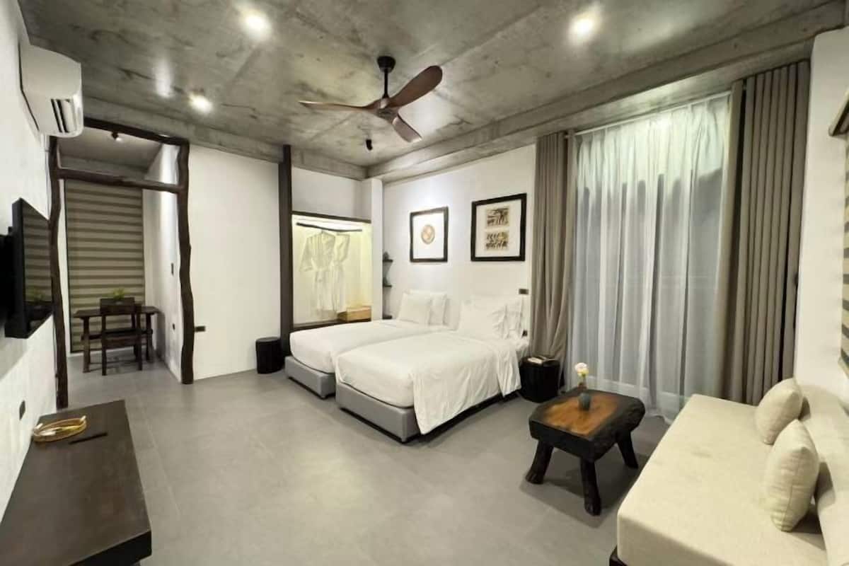 Pillow-top beds, desk, blackout curtains, soundproofing