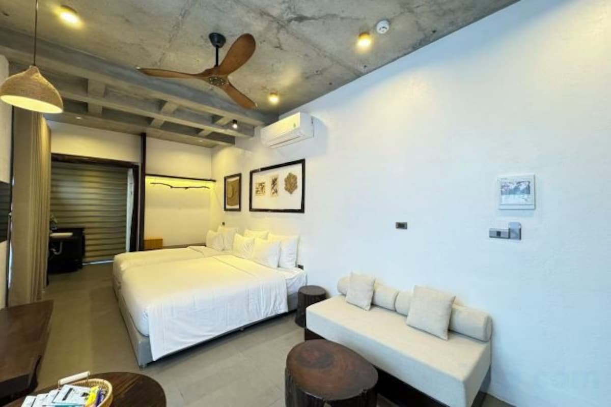 Pillow-top beds, desk, blackout curtains, soundproofing