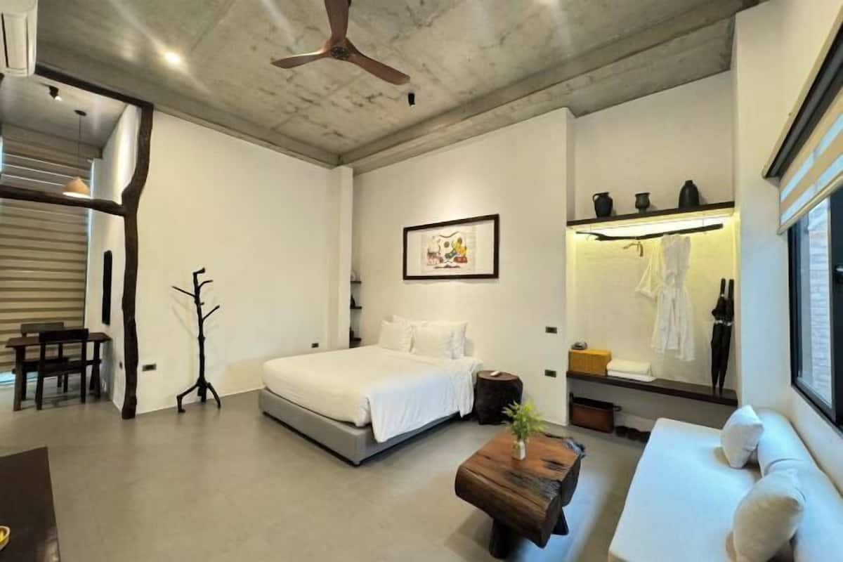 Pillow-top beds, desk, blackout curtains, soundproofing
