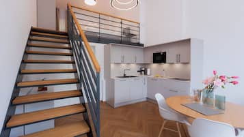 Een koelkast, een magnetron, een kookplaat, een vaatwasser