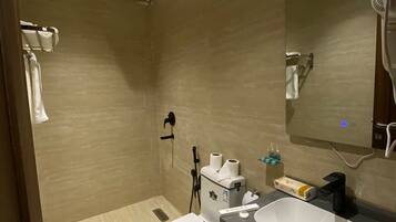 Shower, rainfall showerhead, designer toiletries, hair dryer