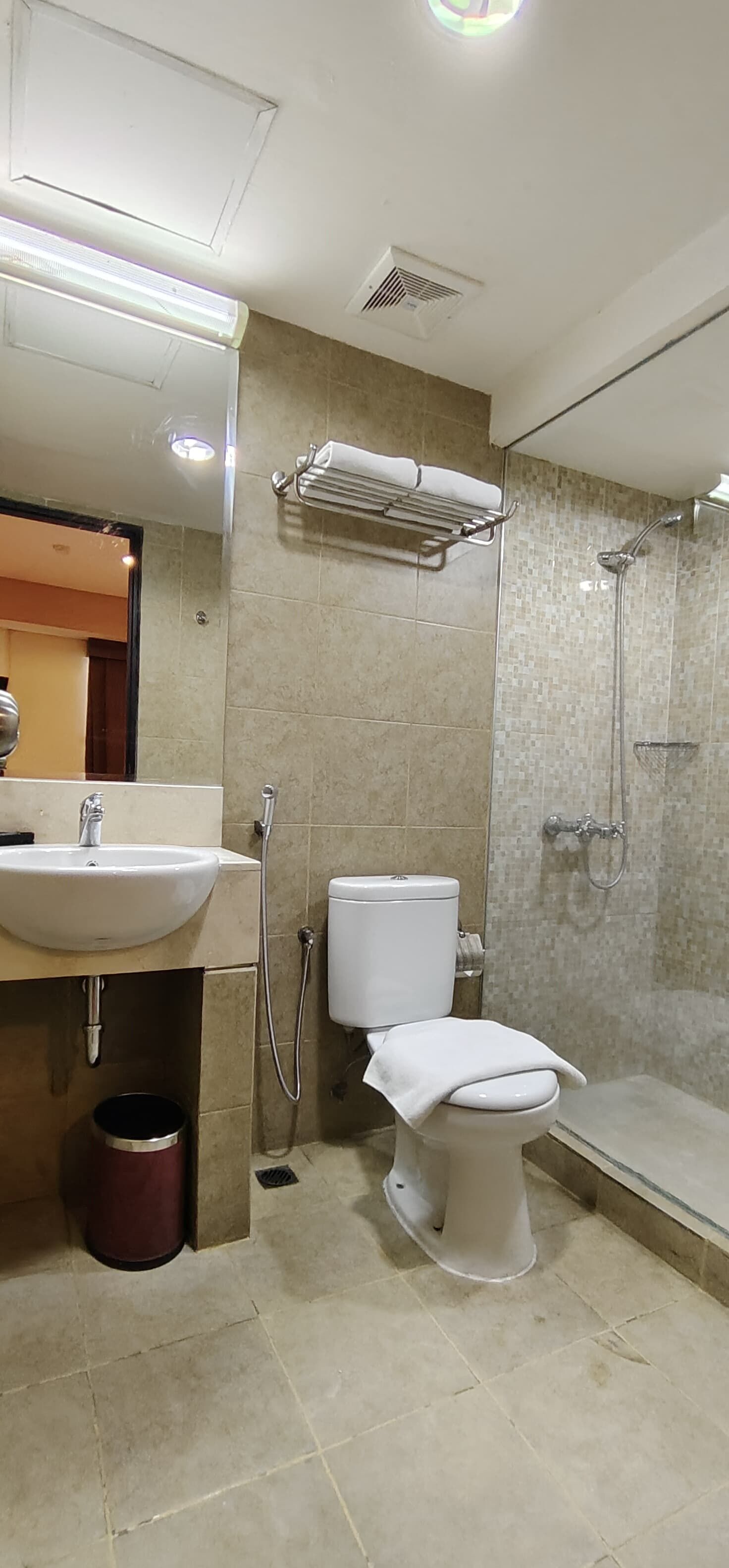 Shower, slippers, towels, soap