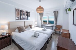 2 quartos, ferros/tábuas de passar roupa, Wi-Fi de cortesia