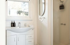 Shower, hair dryer, towels