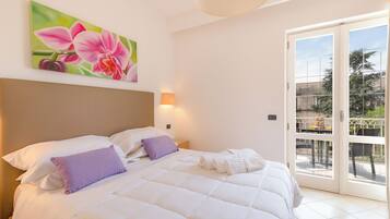 Double Room, Balcony, Garden View | In-room safe, blackout drapes, soundproofing, iron/ironing board