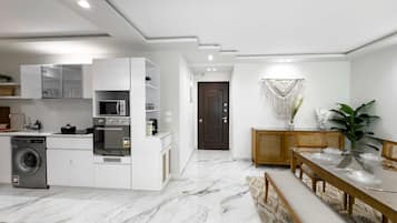 Basic Apartment (Radiant Residence) | Private kitchen | Fridge, microwave, oven, stovetop