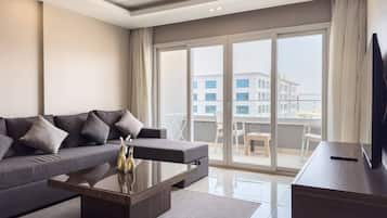 Basic Apartment | Living area | 55-inch TV with digital channels, streaming services