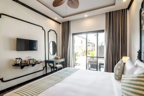 Dobbeltrom – deluxe, hageutsikt | Minibarvarer (inkludert), lydisolert, wi-fi (inkludert) og sengetøy