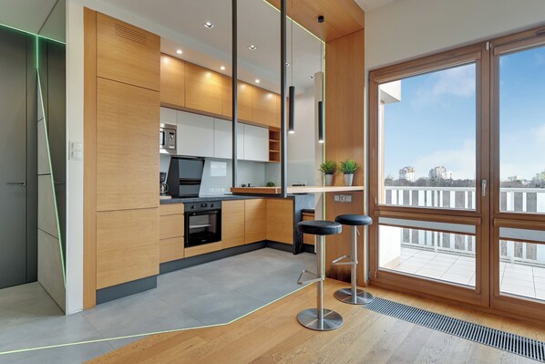 Appartement Supérieur, balcon, vue ville | Salle de séjour