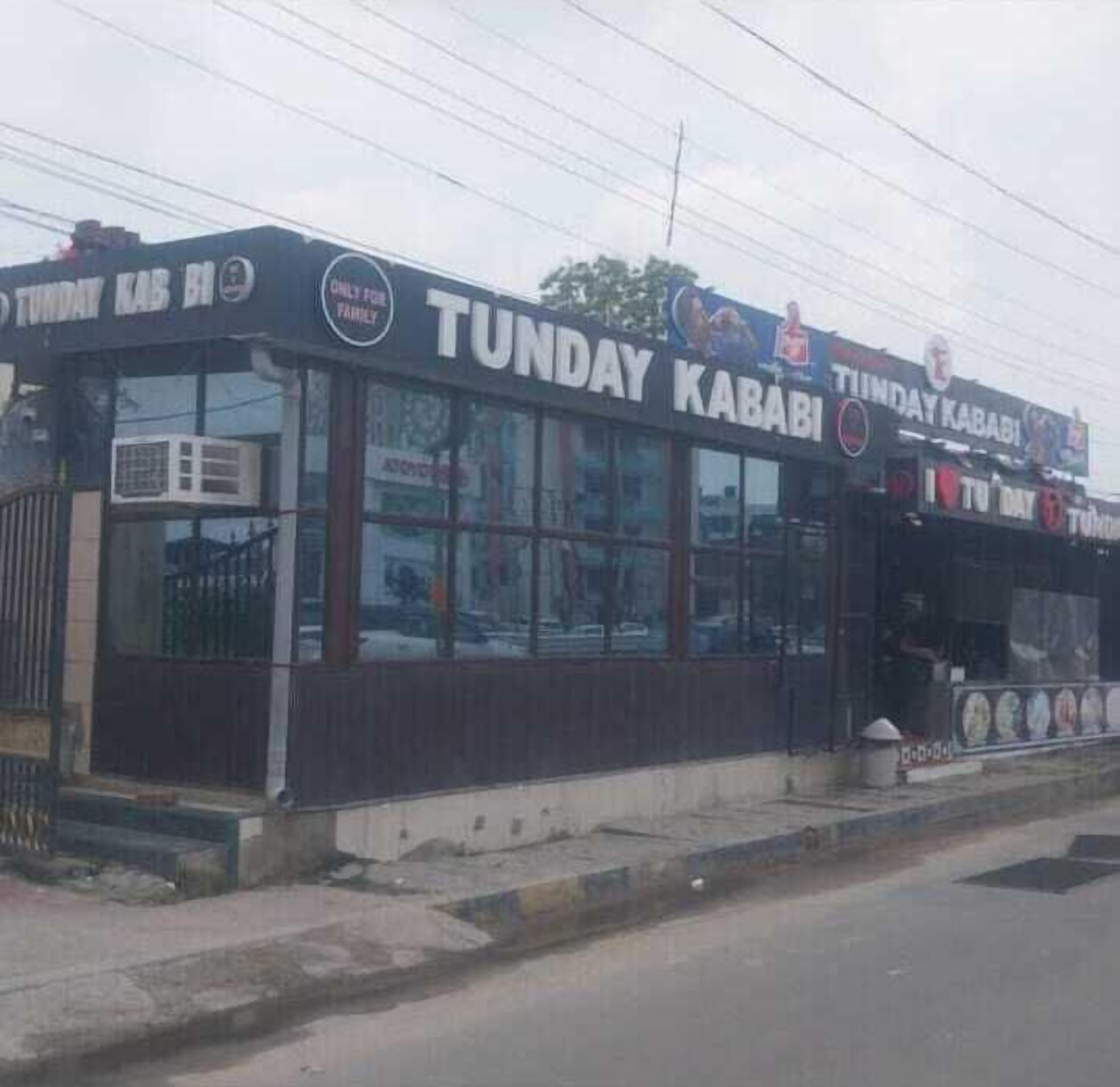 A building with signage reading "TUNDAY KABABI".