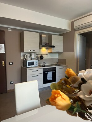 Family Apartment | Living area | 32-inch TV with digital channels