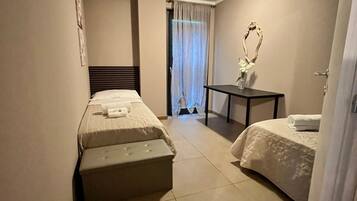 Deluxe Condo | 1 bedroom, blackout drapes, iron/ironing board, free WiFi