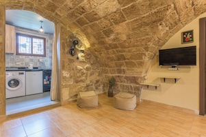 Deluxe Studio, Non Smoking, City View | Living area | 42-inch Smart TV with cable channels, Netflix, streaming services