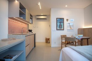 Fridge, microwave, stovetop, coffee/tea maker