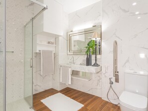 Shower, hair dryer, towels, soap