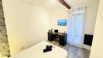 1 chambre, fer et planche à repasser, Wi-Fi, draps fournis
