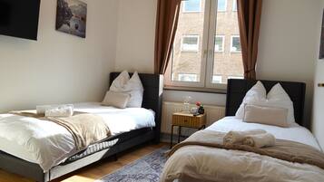 2 bedrooms, desk, iron/ironing board, travel crib