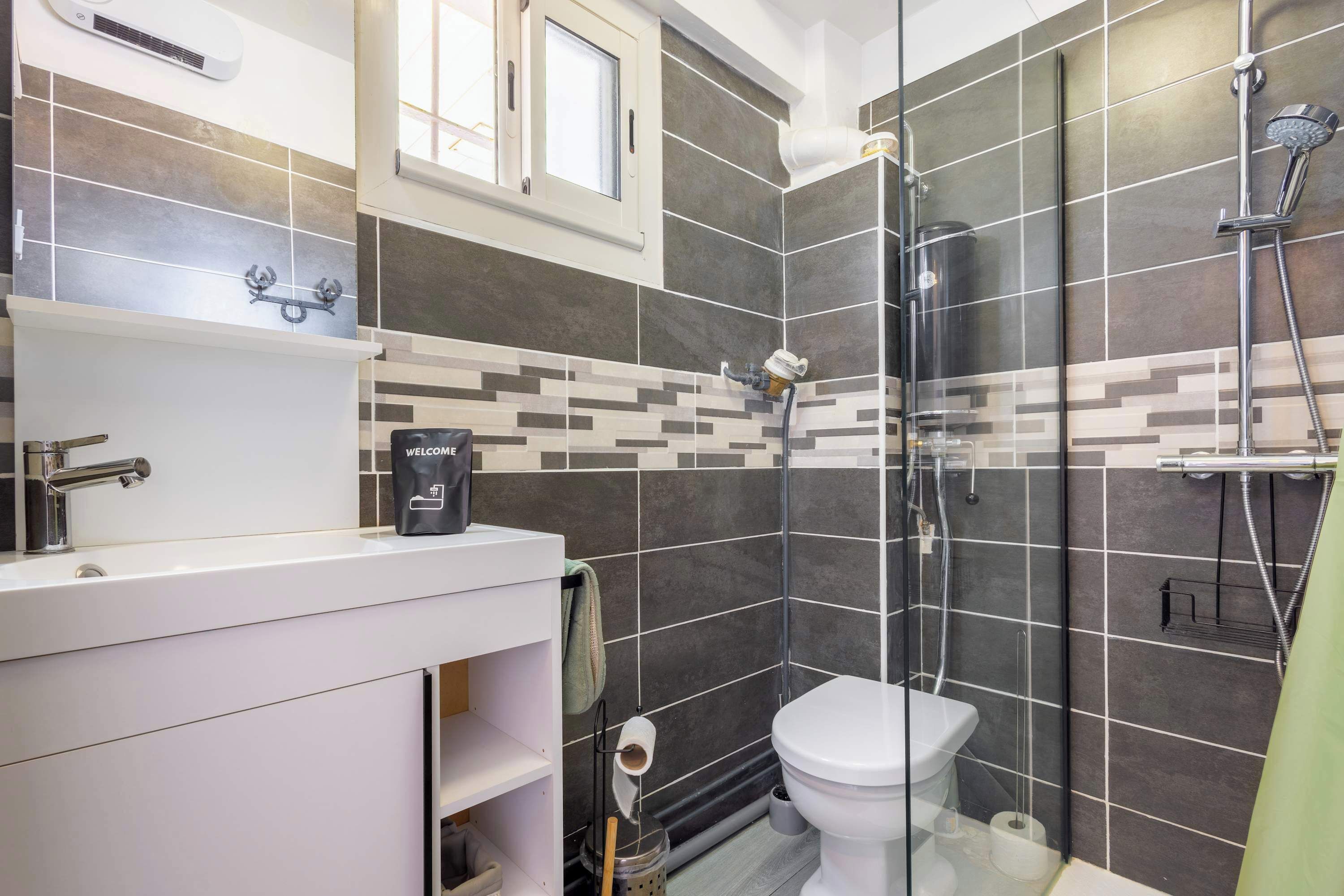 Shower, hair dryer, towels, shampoo