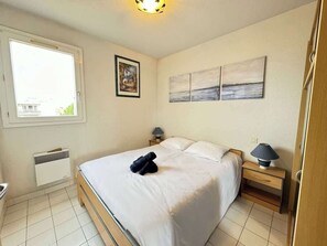 2 bedrooms, iron/ironing board, travel crib, bed sheets