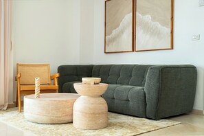 Apartment, Sea View | Living area | TV