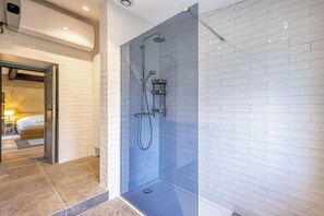Shower, hair dryer, towels, soap