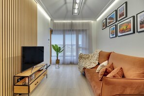 Appartement Classique, balcon | Salle de séjour